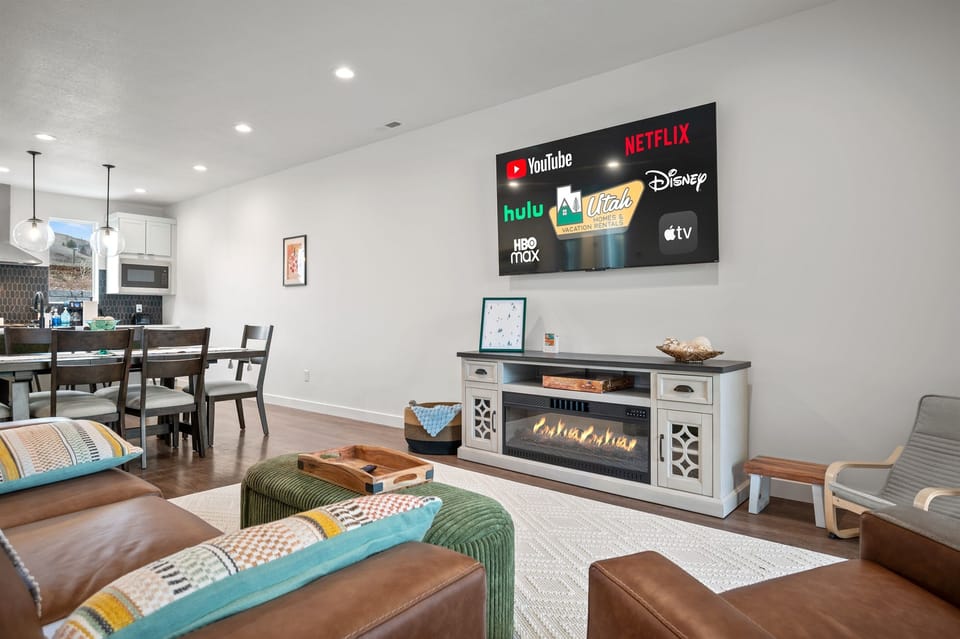 Plush seating, expansive smart TV, fireplace for relaxing in the evenings.