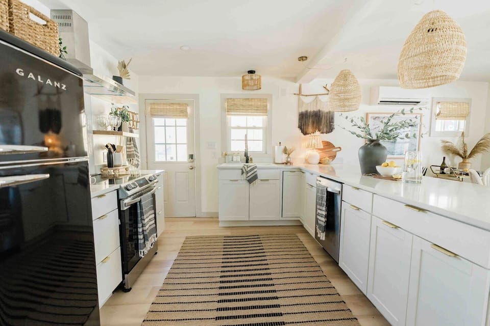 fully stocked kitchen with full sized oven 
