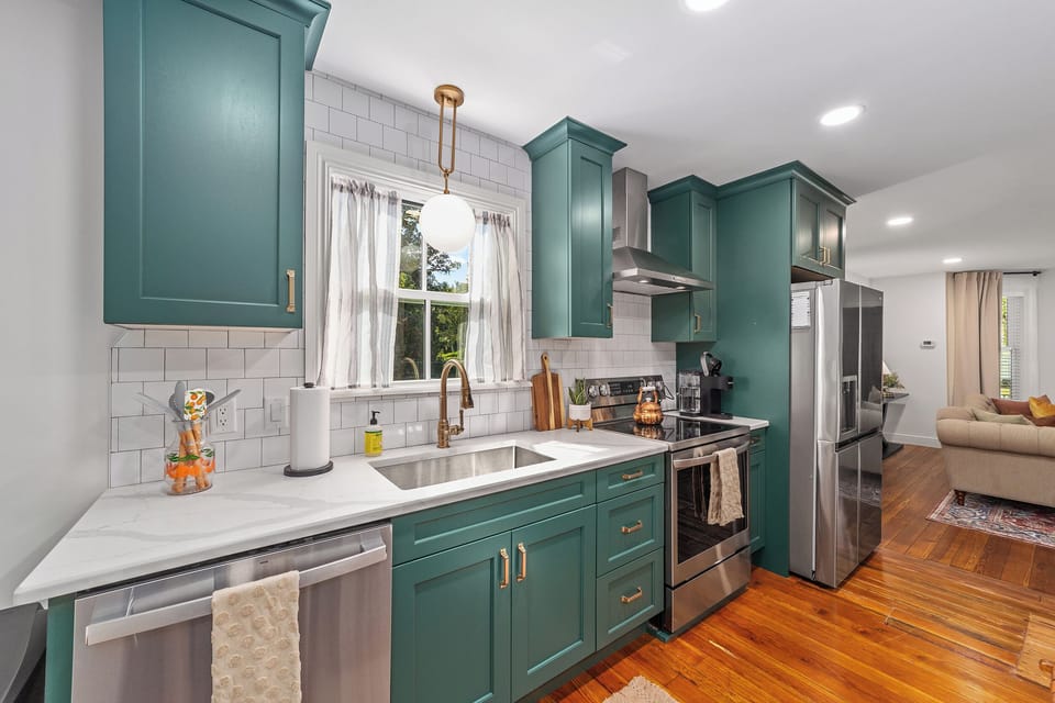 Fully stocked kitchen with Williams-Sonoma cookware, dishwasher & coffee bar.