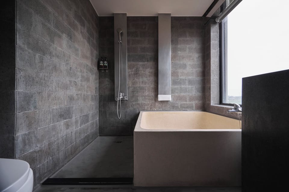 Luxury Double Room, Courtyard View | Bathroom | Combined shower/tub, hair dryer, towels