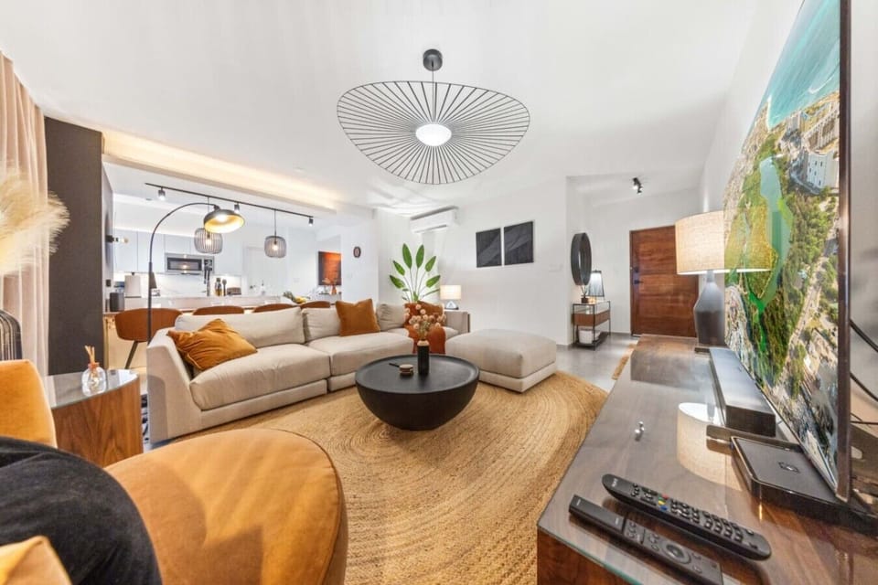 Welcome to your fabulous hangout! This vibrant living room is bursting with style and ready for unforgettable moments!