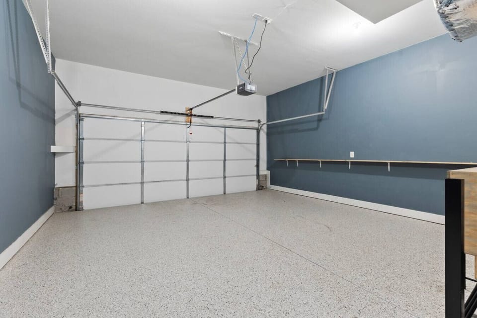 This private garage can fit 2 cars. There is additional free street parking.