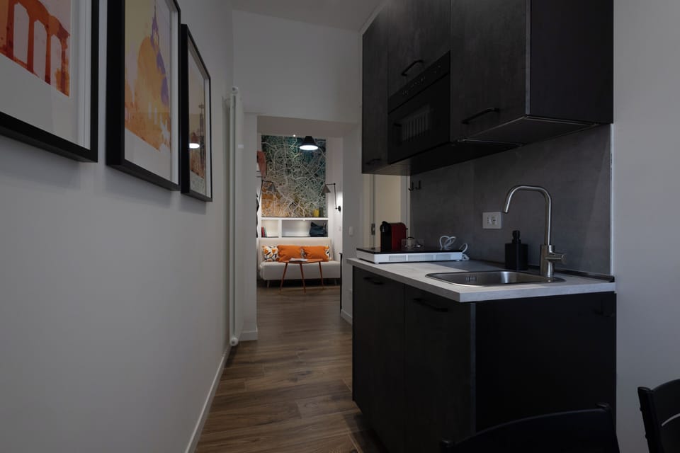 Family Suite, 1 King Bed with Sofa bed, Non Smoking, Kitchenette | Living area | Smart TV
