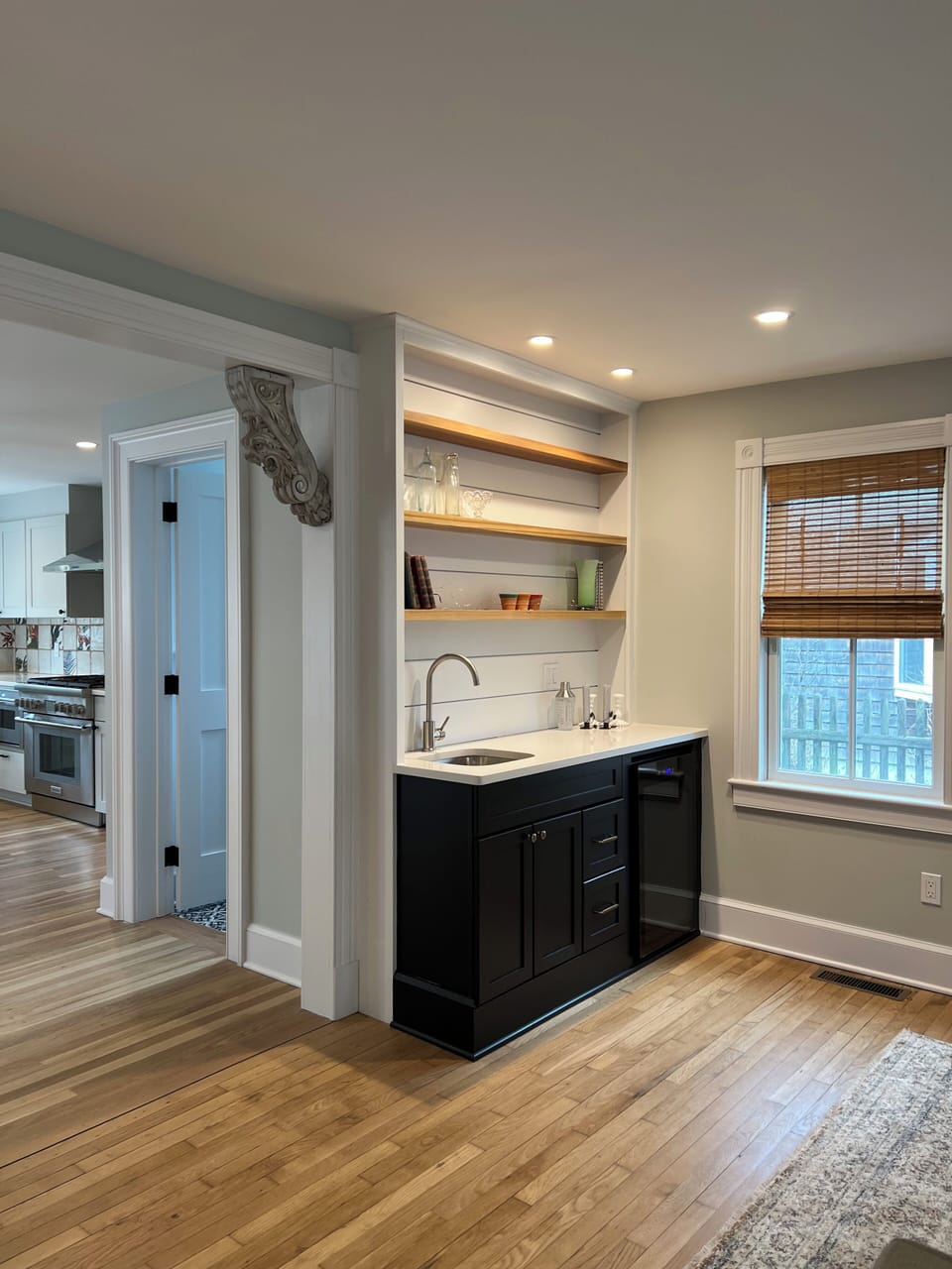 Wet bar with wine cooler.