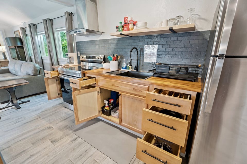 Spacious drawers and cabinets keep everything organized—pots, pans, spices, and utensils ready for any recipe.