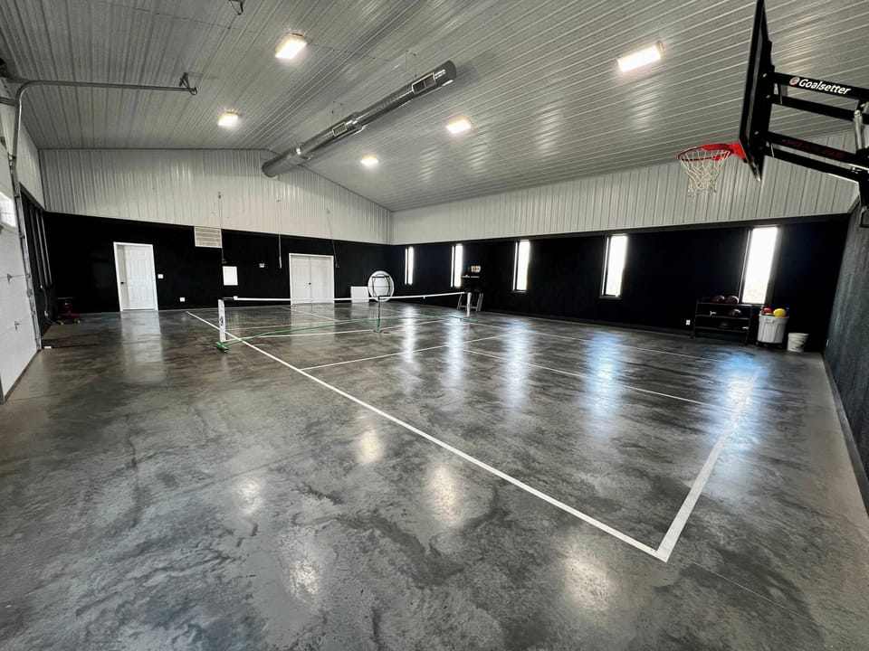 Gym with half court basketball & pickleball