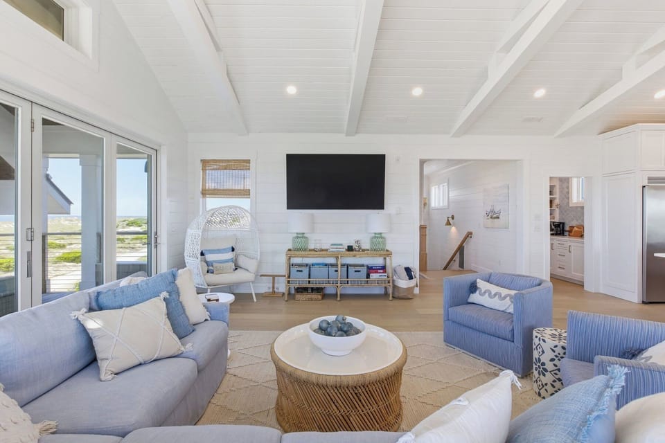 LIVING ROOM IS GRACIOUS AND COMFORTABLE