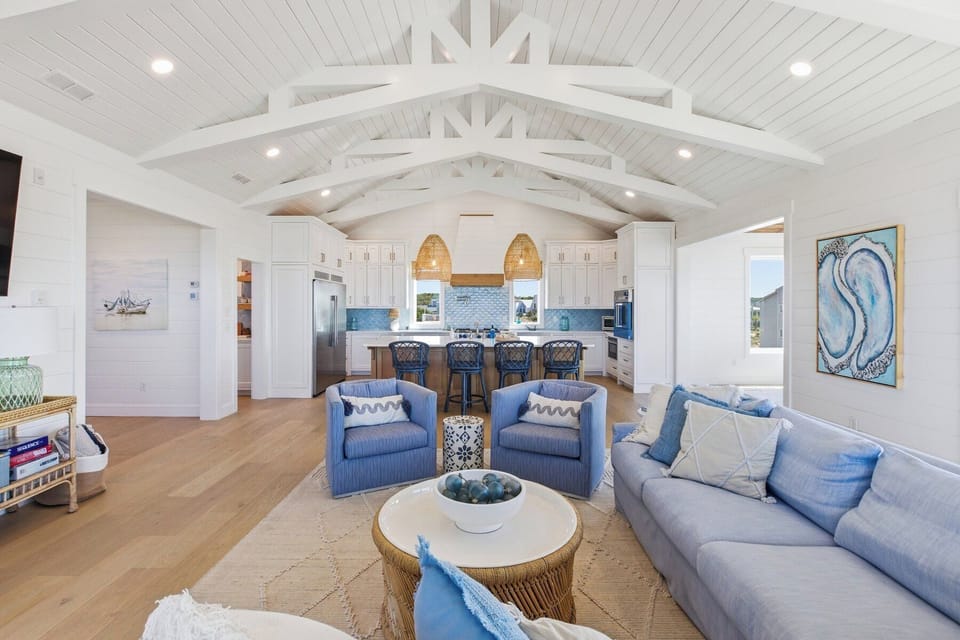 GRAND LIVING OPEN TO KITCHEN, DINING, AND OUTDOOR UPPER DECK