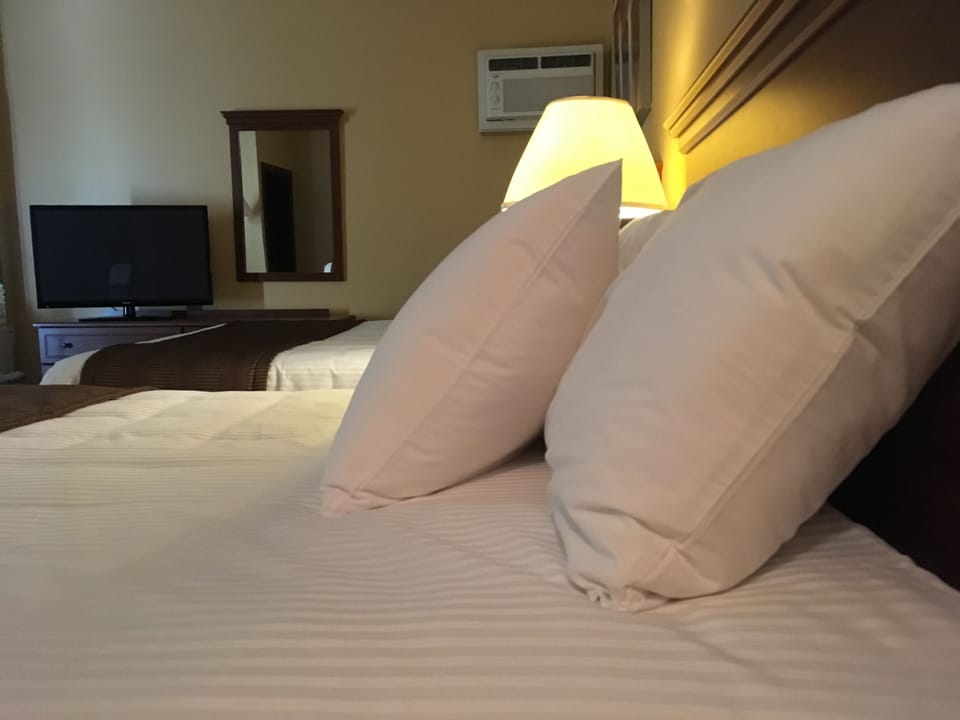Deluxe Room, 2 Queen Beds, Jetted Tub | Desk, iron/ironing board, free WiFi, bed sheets
