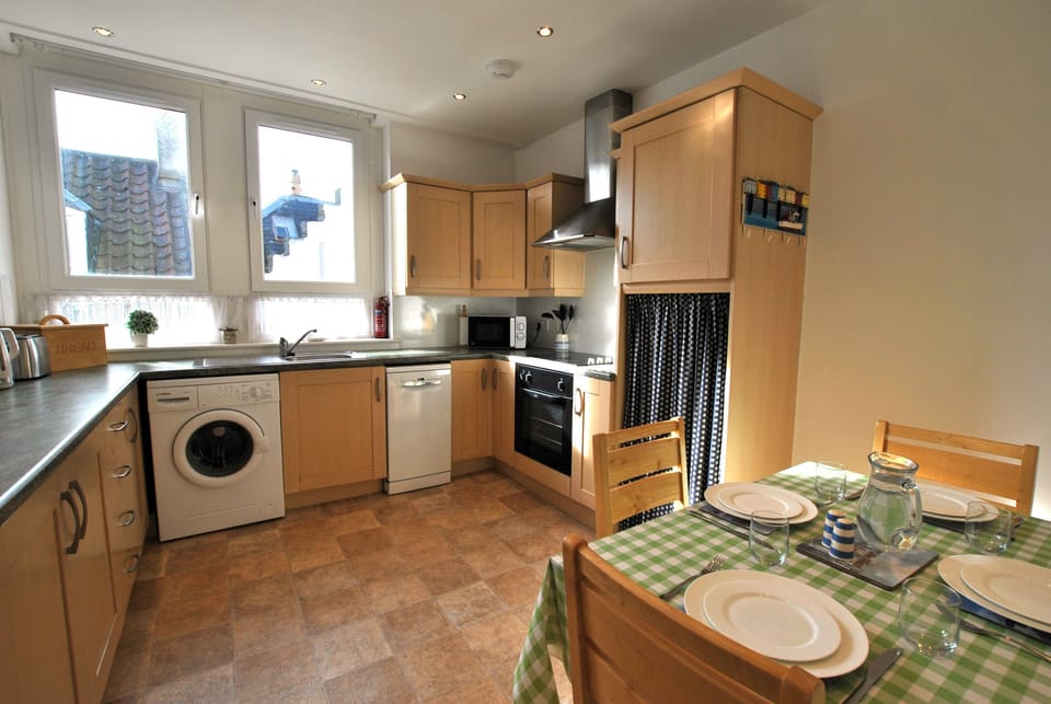 The dining kitchen is well-equipped