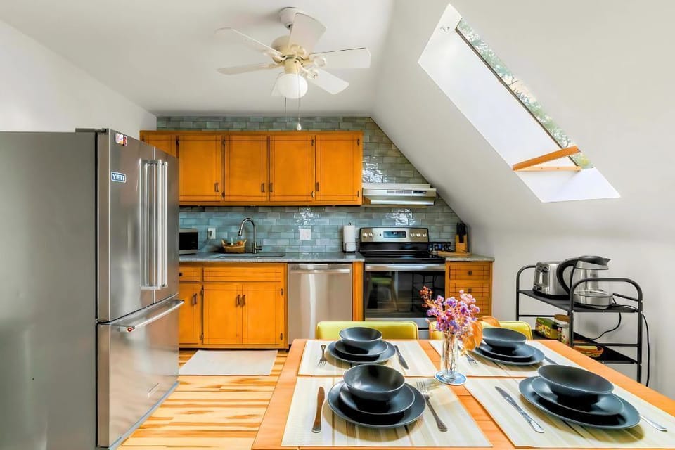 Enjoy cooking and dining in this unique loft space.