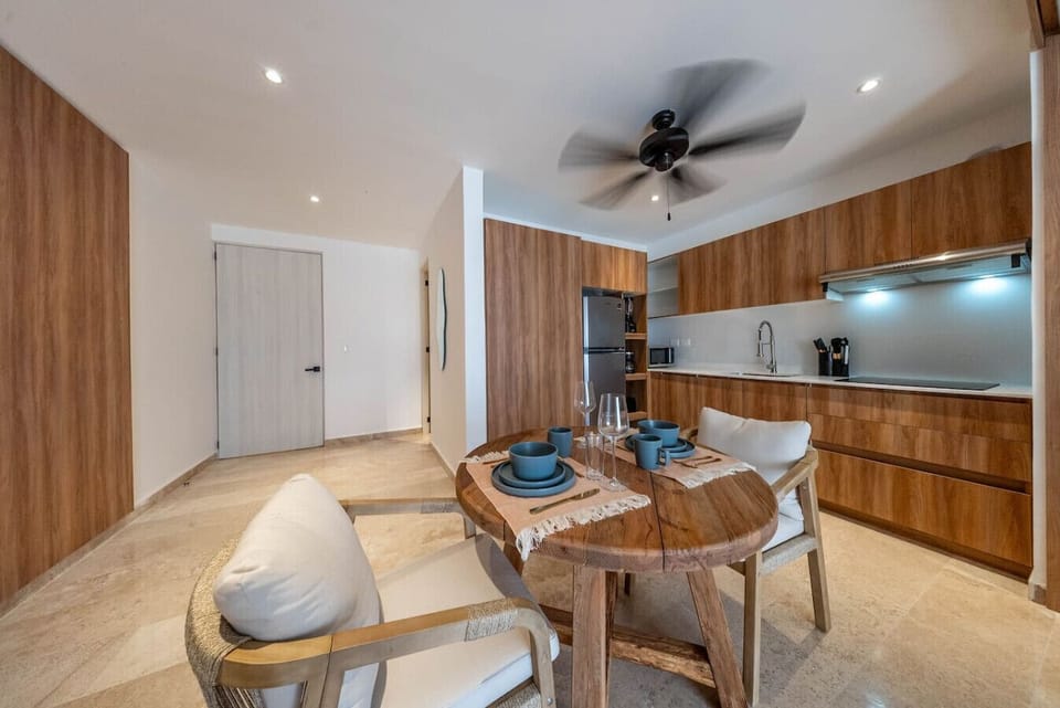 A well-lit dining area with plenty of room for everyone to sit comfortably.