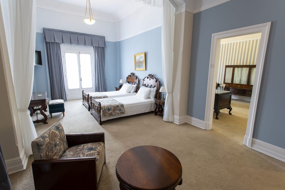 Presidential Studio Suite, Multiple Beds | Minibar, desk, bed sheets