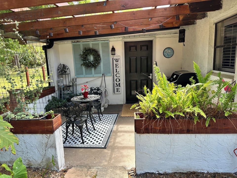 This patio off of the king room is complete with mini fridge and Webber grill.