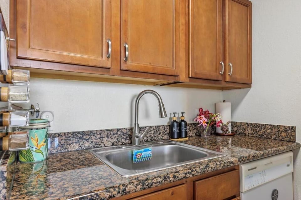 All utensils, spices, and baking items provided in this updated kitchen.