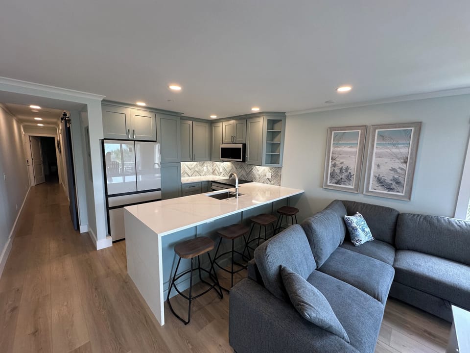Waterfall Quartz Countertop with Counter Bar Seating