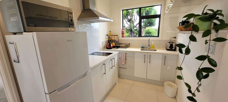 The kitchen with a toaster, electric kettle, rice cooker etc