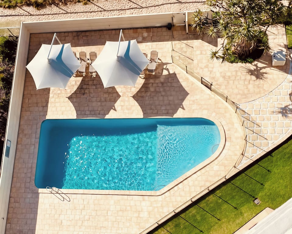 Private pool villa with sun deck, loungers and resort-style feel