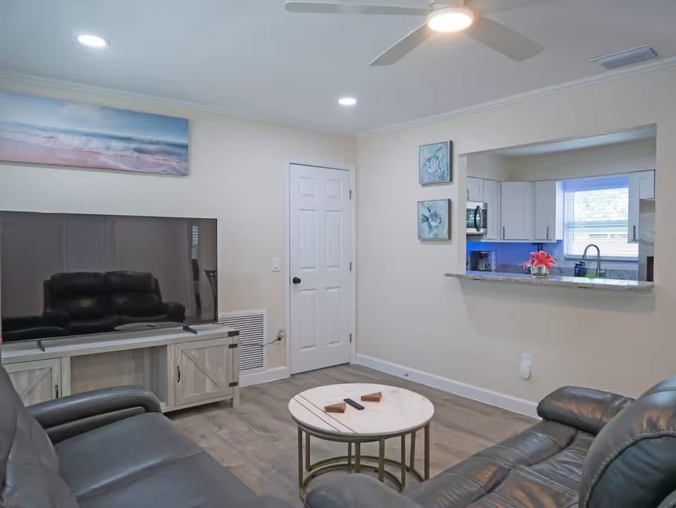 Spacious Living Room with TV