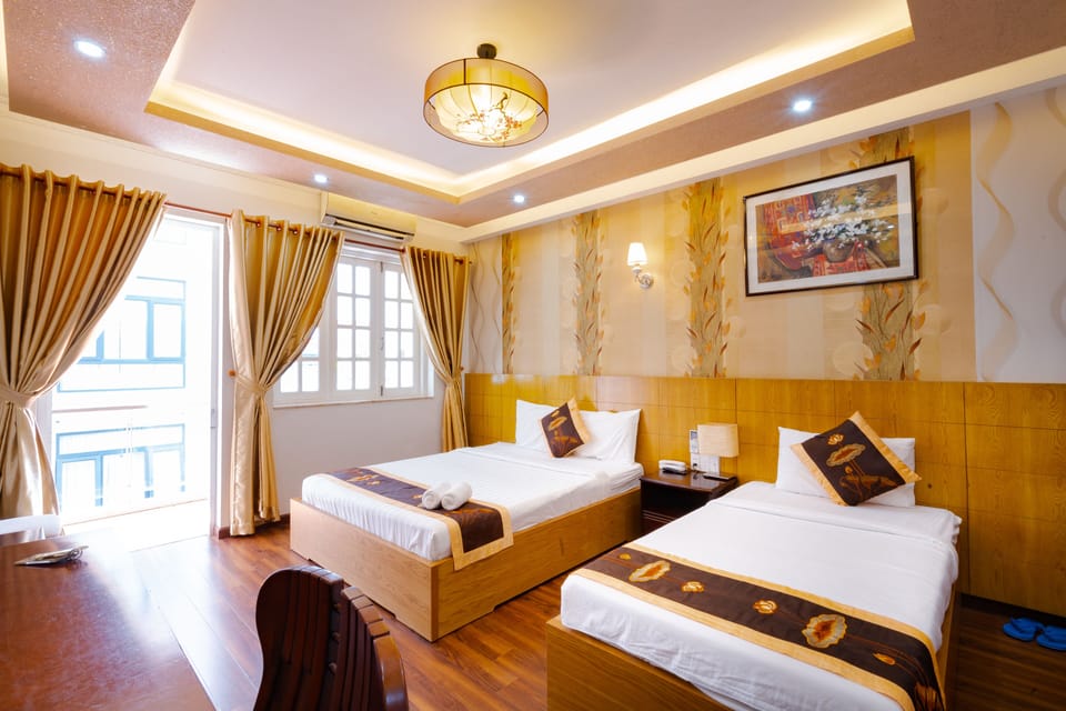 Family Room with Balcony | Minibar, in-room safe, laptop workspace, blackout drapes