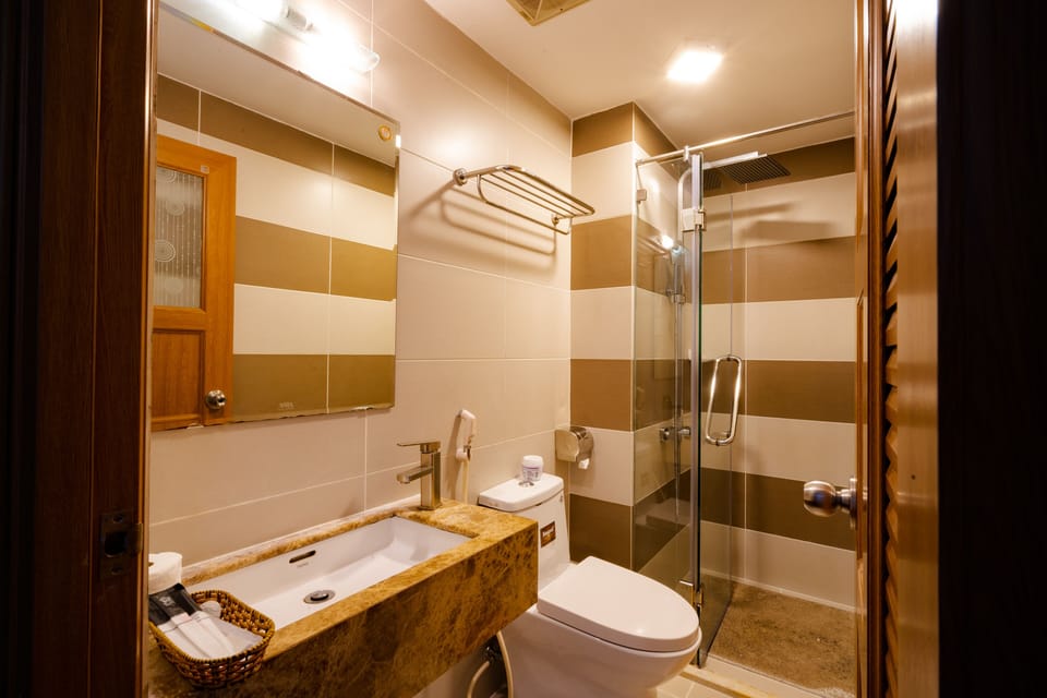 Standard Double Room - No Window | Bathroom | Shower, free toiletries, hair dryer, slippers
