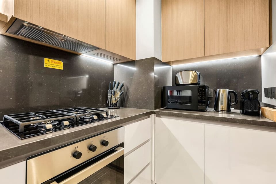 Kitchen: Sleek design with modern appliances for your culinary adventures!