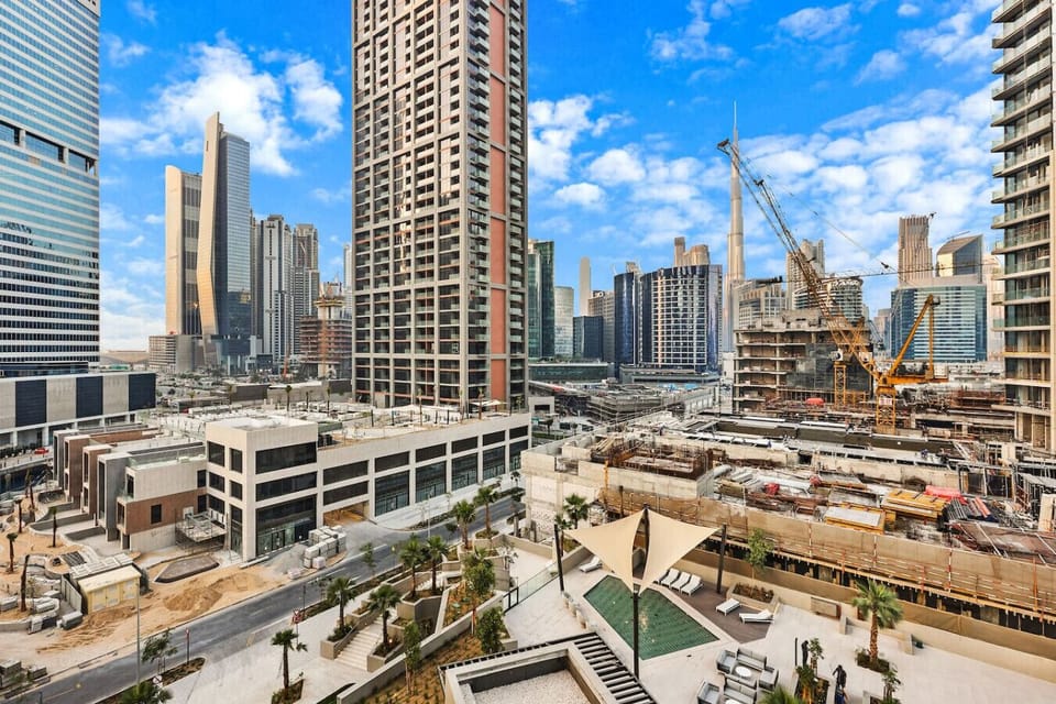 View from the Balcony: Enjoy stunning skyline views and vibrant city life right from your retreat!