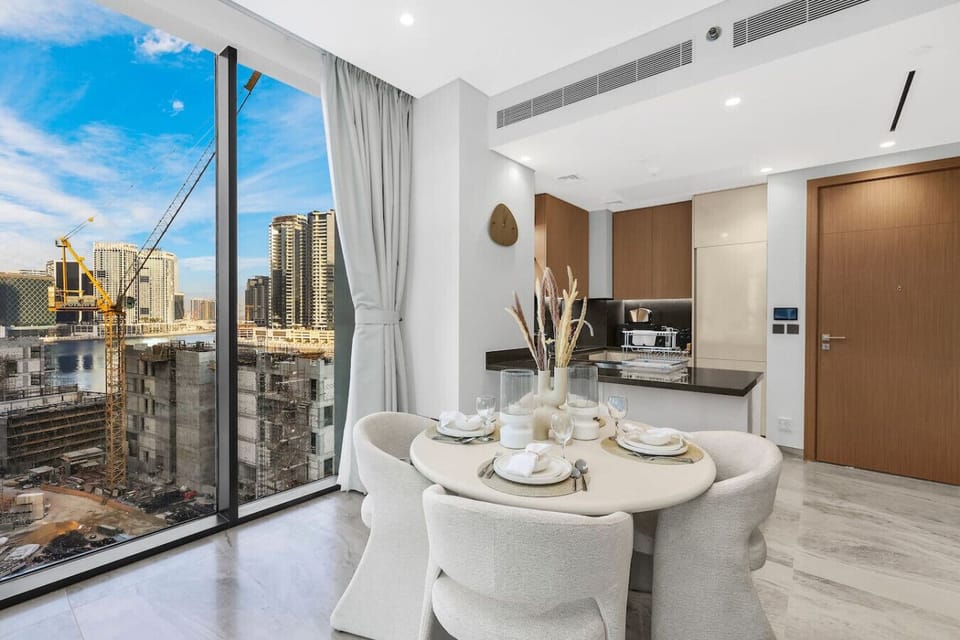 Dining Area: Enjoy skyline views while dining in this stylish space with modern decor!
