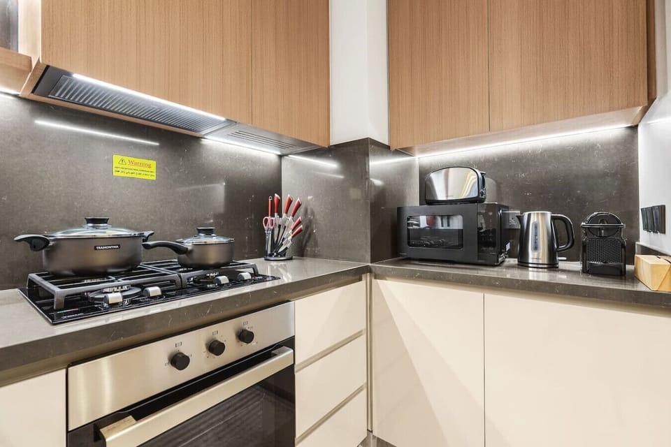 Kitchen: Cook like a pro in this sleek, modern kitchen equipped with top-notch appliances!