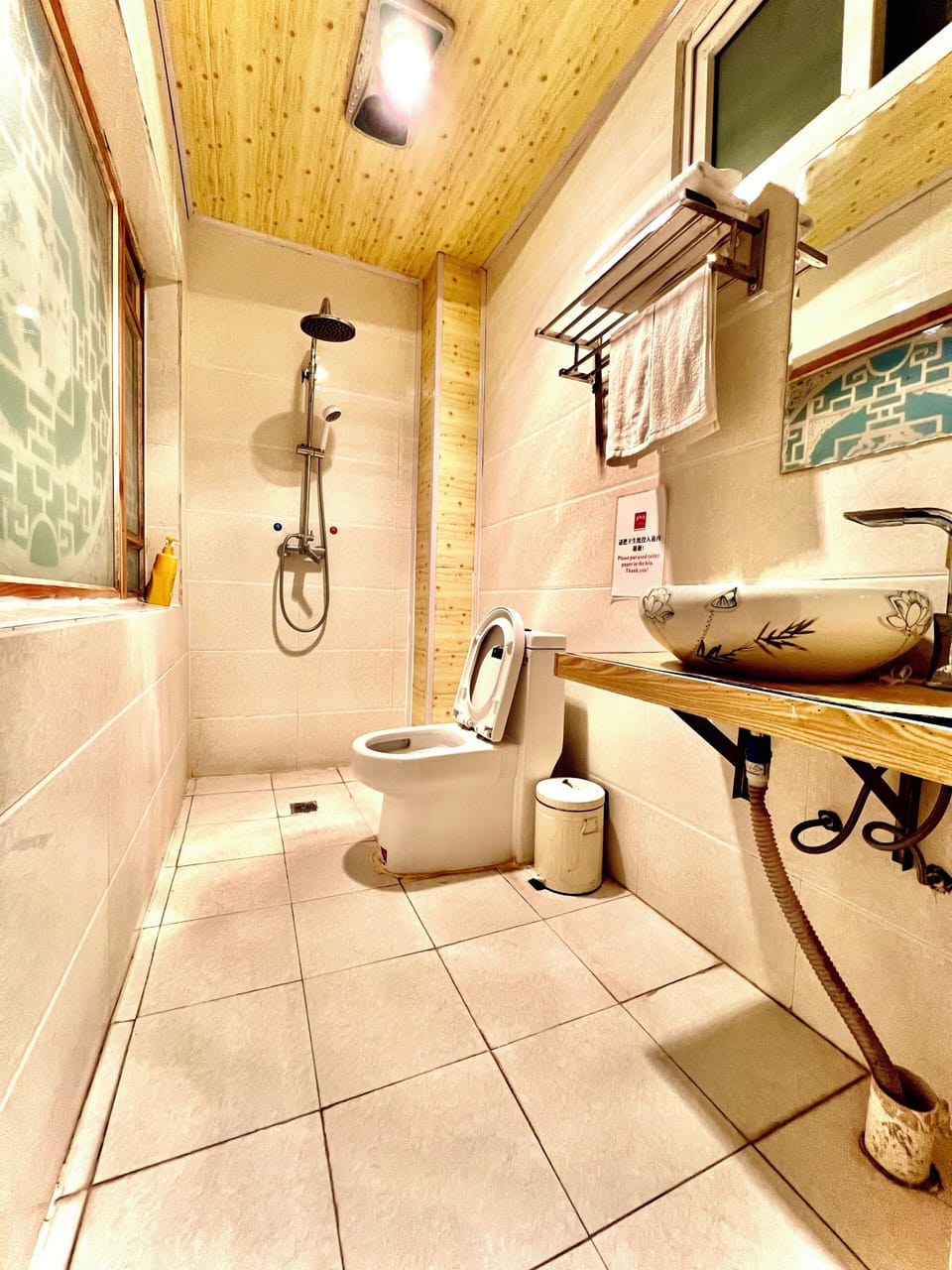 Shower, free toiletries, hair dryer, slippers
