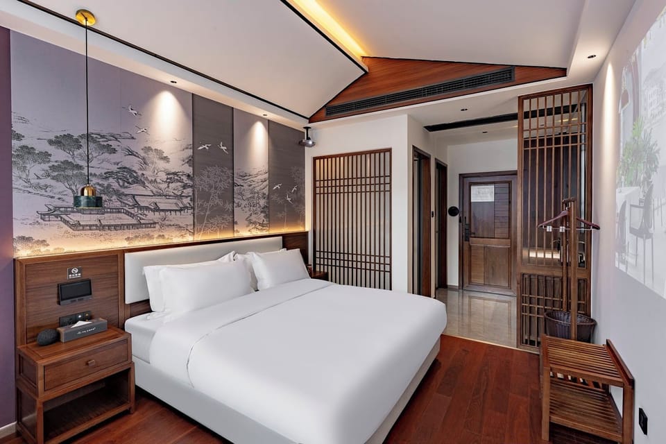 Premium bedding, down comforters, pillowtop beds, minibar