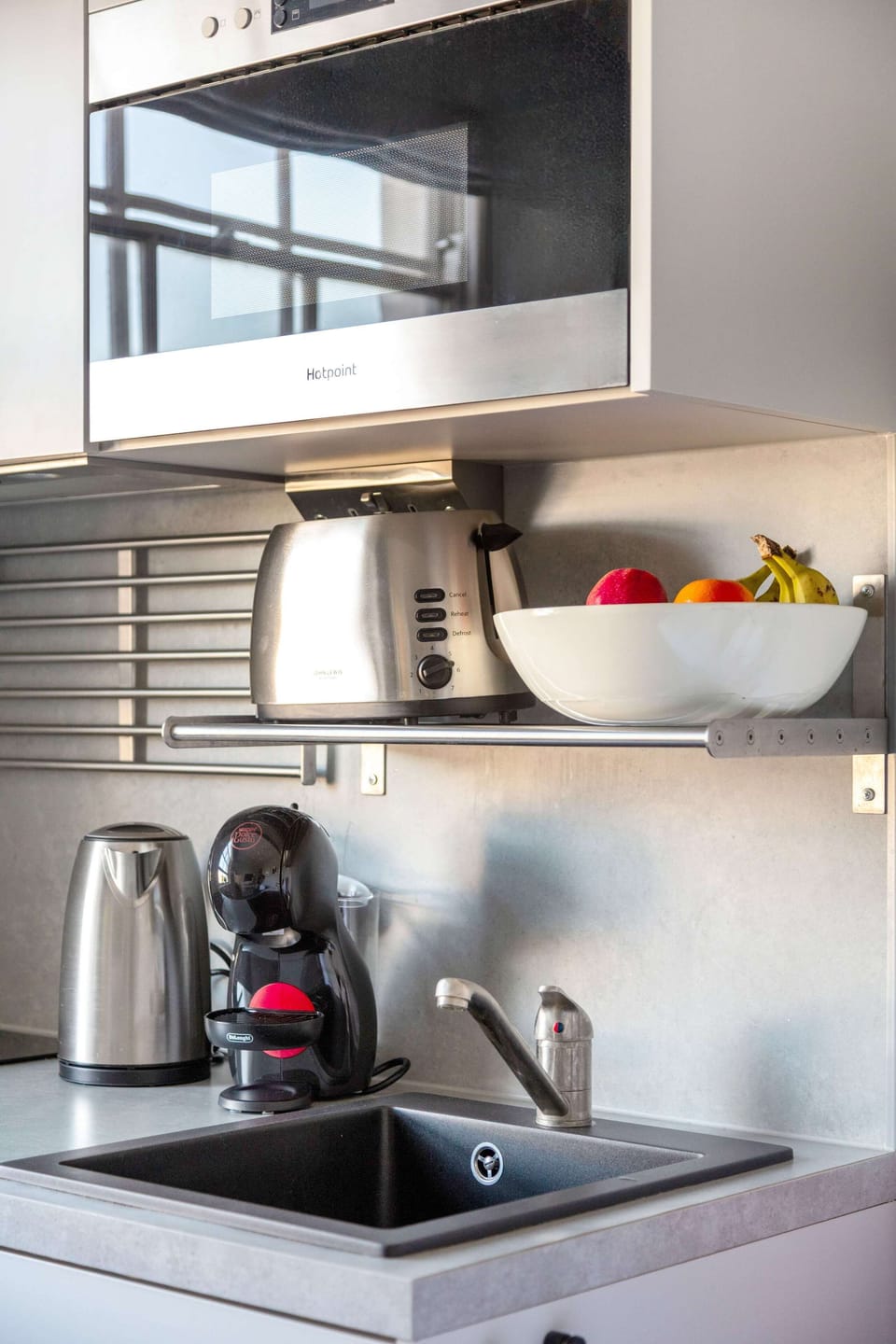 The kitchen is fully equipped to prepare a simple meal 