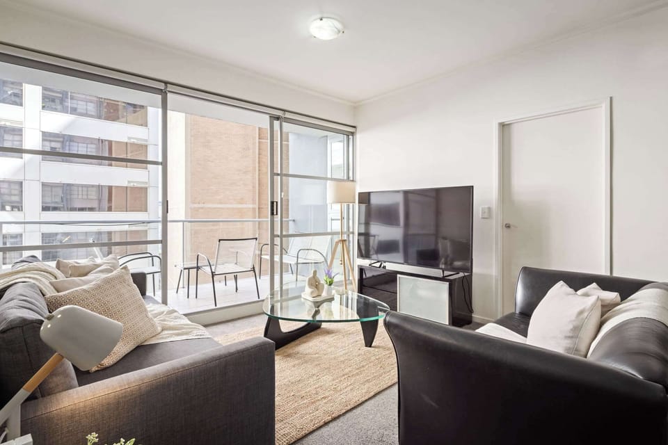 The living area with a 3-seater sofa bed that folds out to a double and a 2-seater couch.