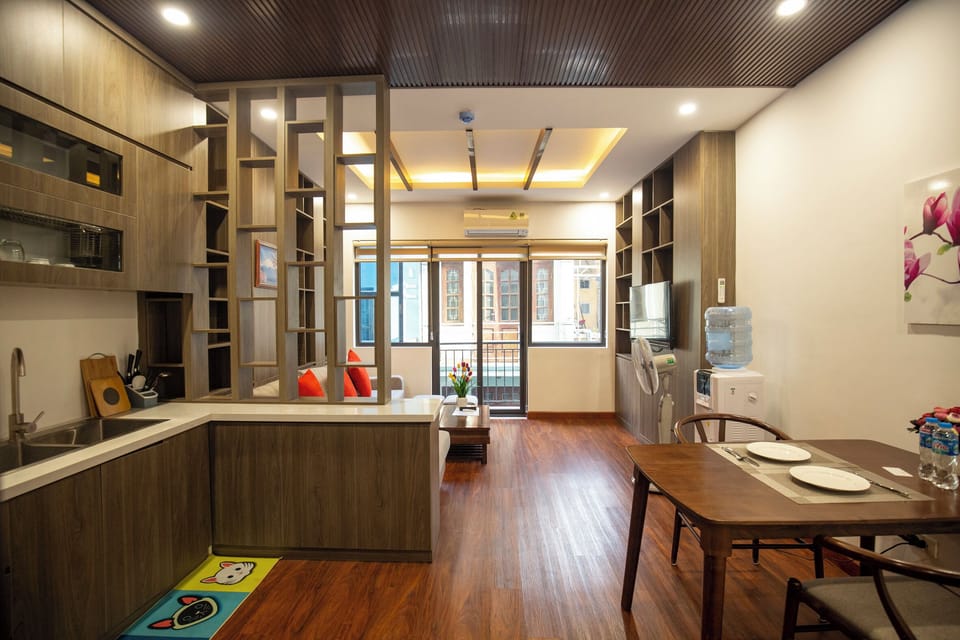 Deluxe Apartment, City View | Living area | 50-inch flat-screen TV with cable channels
