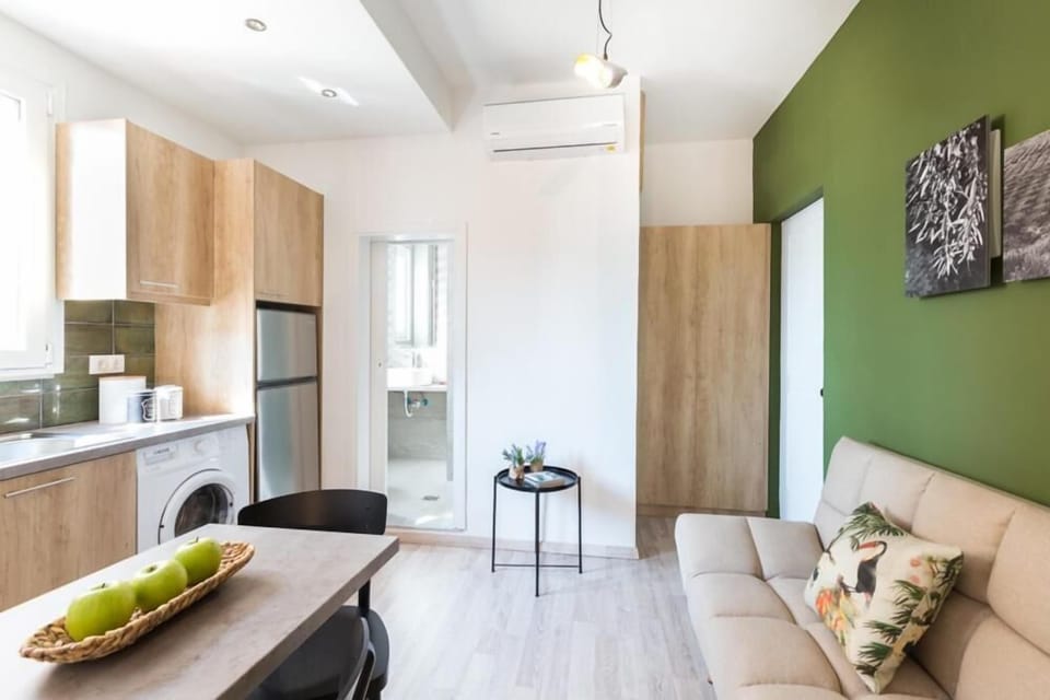 Comfort Apartment, Balcony, Beach View | Living area | Flat-screen TV