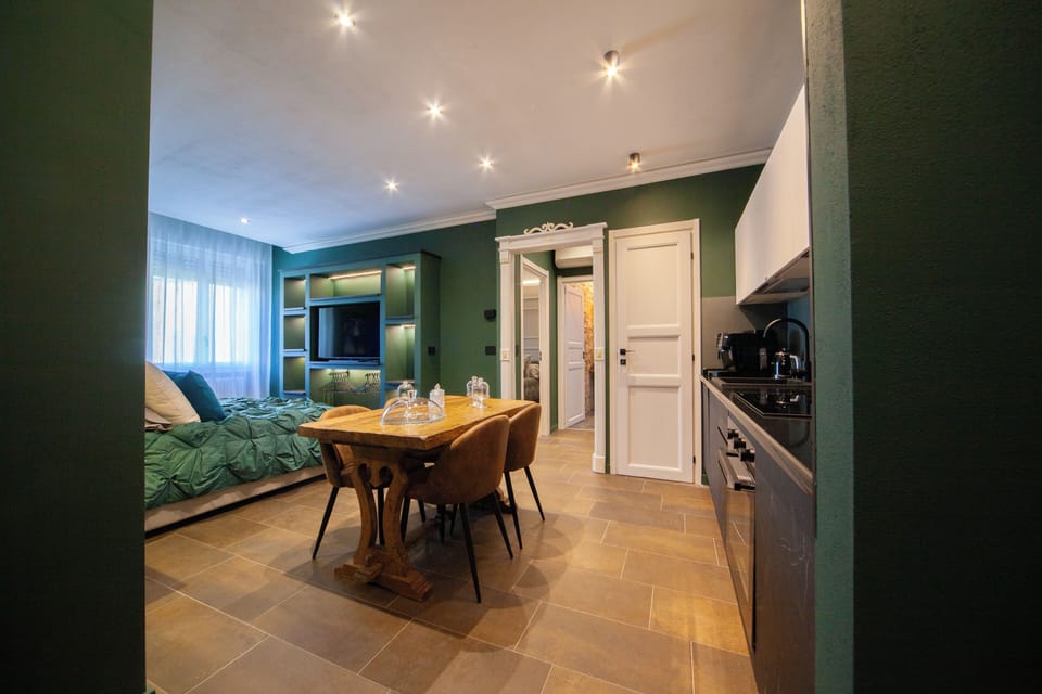 Deluxe Apartment | Living area | TV
