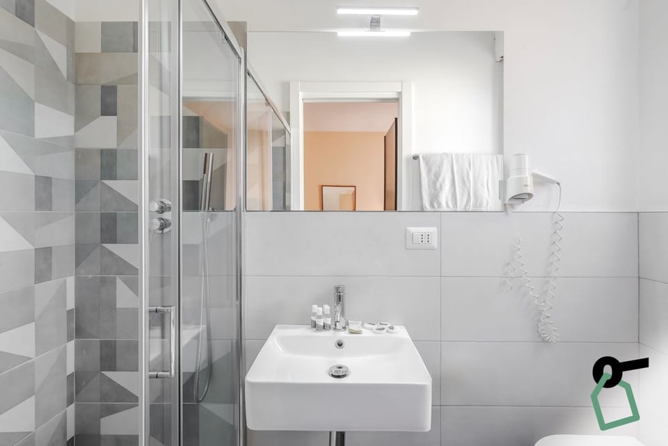 Quadruple Room, Balcony | Bathroom | Free toiletries, hair dryer, towels, toilet paper