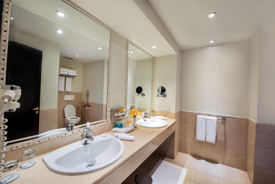 Shower, free toiletries, hair dryer, slippers