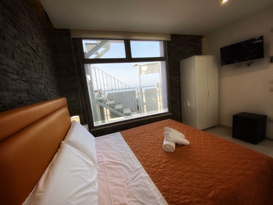 Comfort Double Room, Patio, Partial Ocean View | In-room safe, iron/ironing board (on request), WiFi (free)