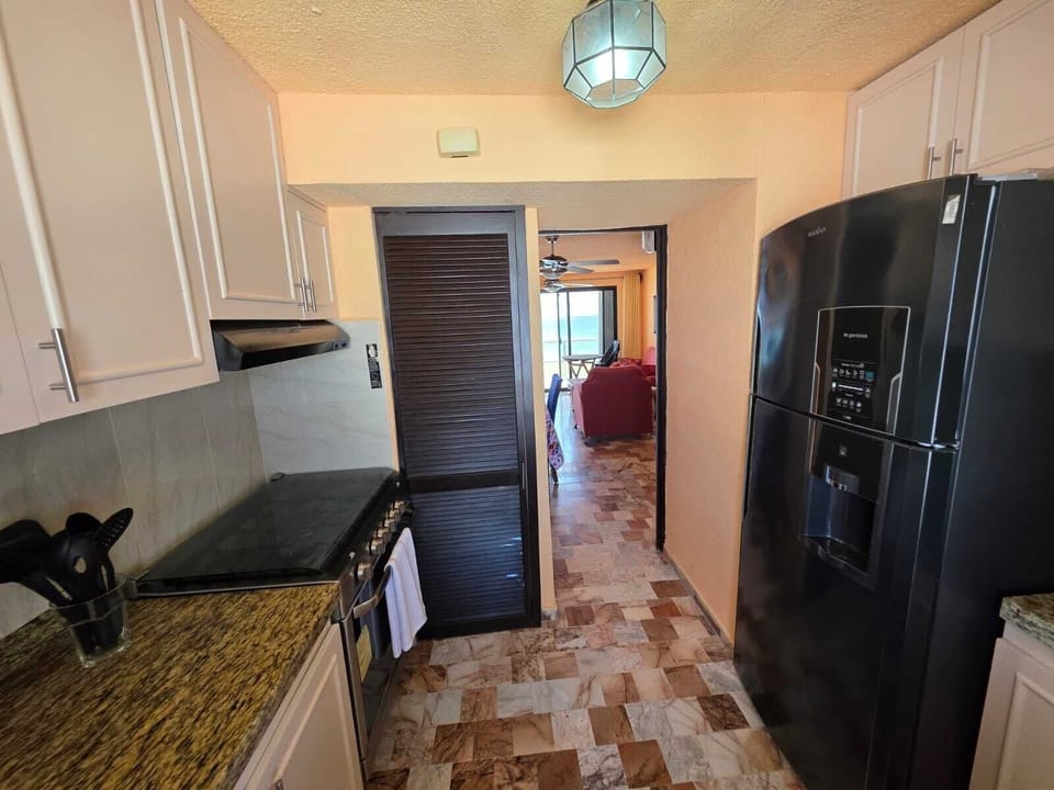 Family Apartment, Beach View | Private kitchen | Fridge, microwave