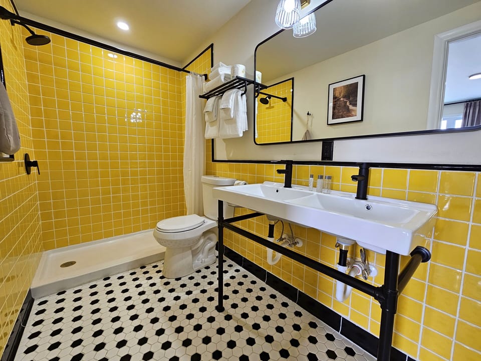 Junior Suite, Lake View | Bathroom | Shower, hair dryer, towels, soap