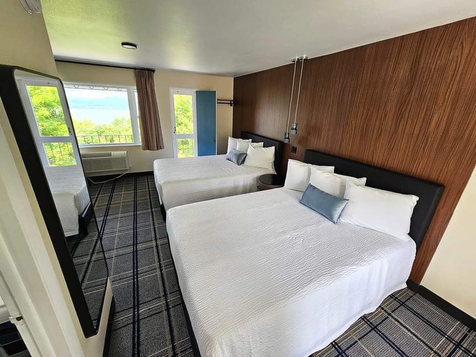 Deluxe Double Room, Lake View | Individually furnished, desk, laptop workspace, blackout drapes