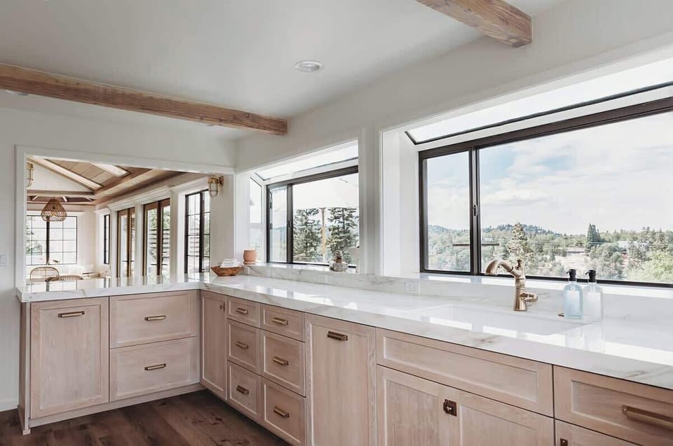 Every window on the front of the house has a panoramic view of the lake