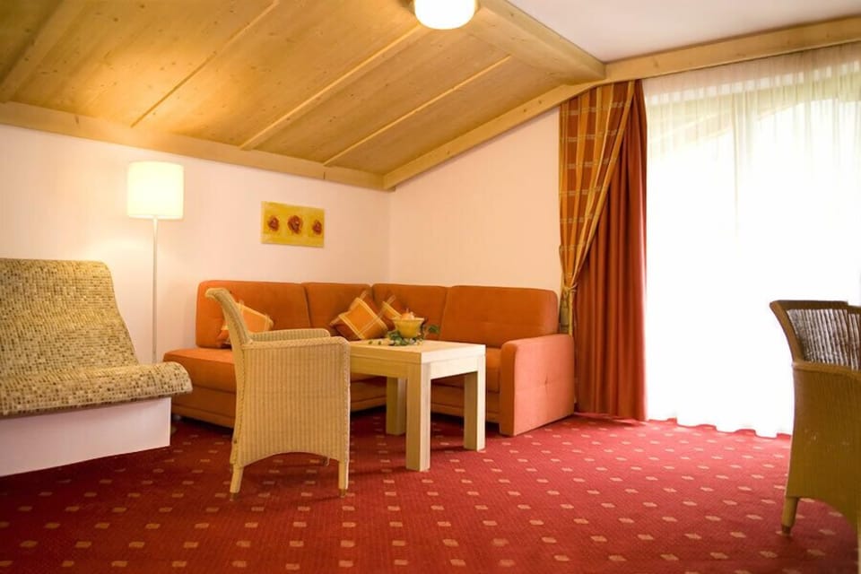 Family Suite (2 Adults, 3 Children) | Living area | Flat-screen TV