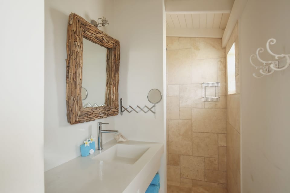 Shower, rainfall showerhead, hair dryer, towels