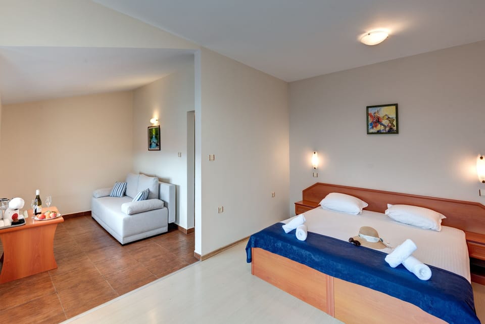 Classic Studio, Balcony, Sea View | In-room safe, individually decorated, individually furnished, desk