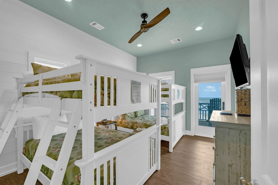 Sea It All: Full bunk room, excellent for families, youth guests and sleeps 8. With full closet, storage chest available under the SMART TV w/ personal access to the upper deck.