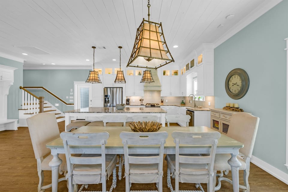 Sea It All: Dining area seats up to 8 at the modern farmhouse chic dining table. 
