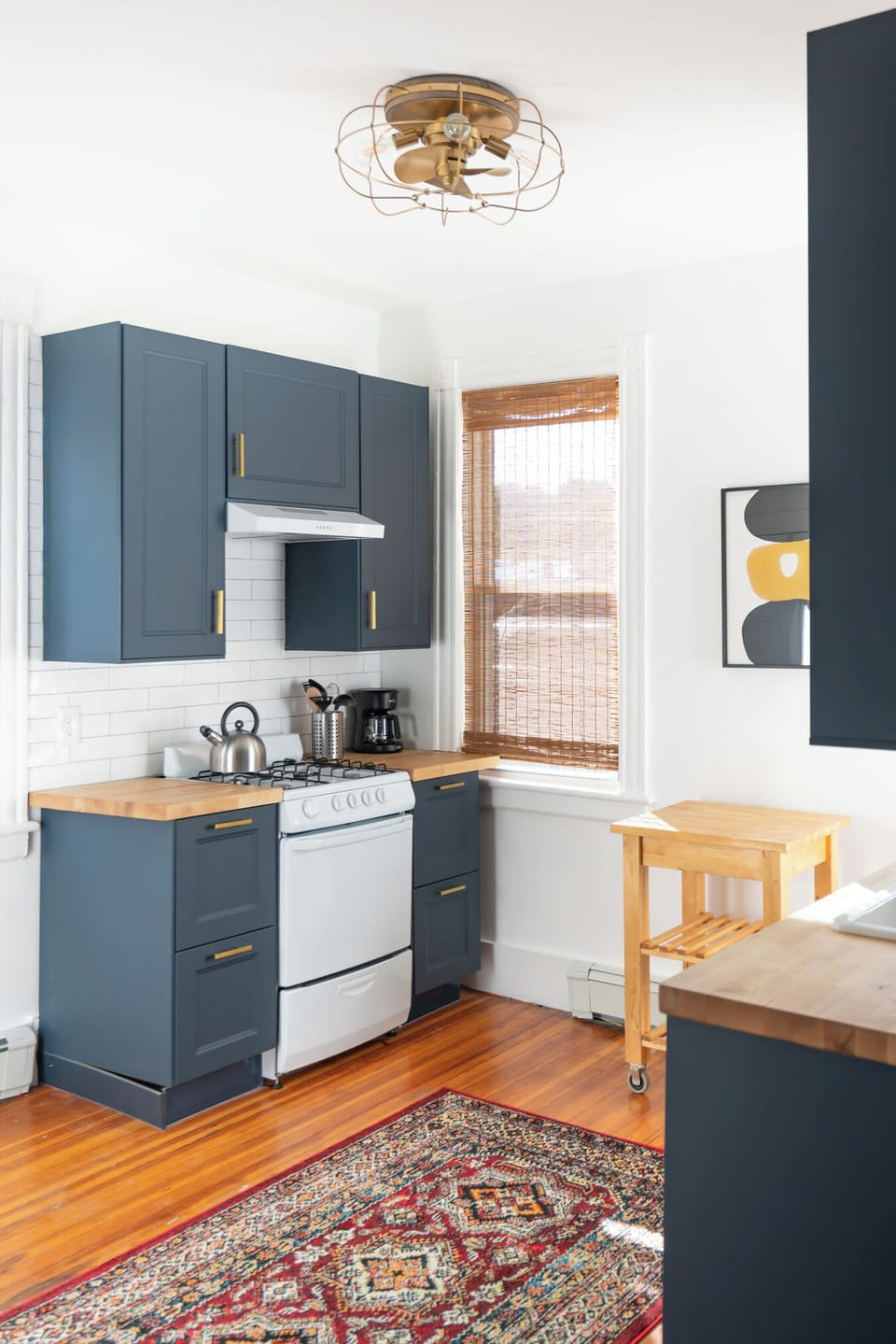 Kitchen with microwave, oven, dishwasher