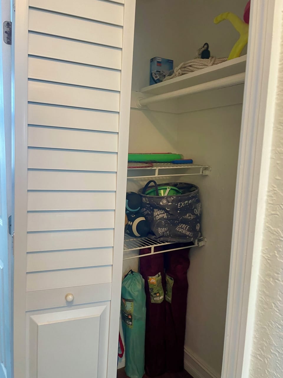 Beach closet with toys, chairs and more!